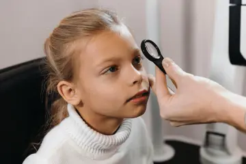 Child undergoing an eye examination