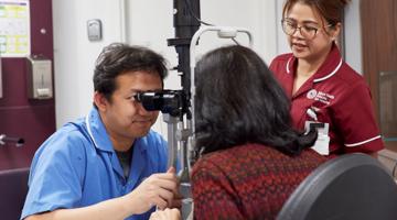 A photo of a patient having eye diagnostics