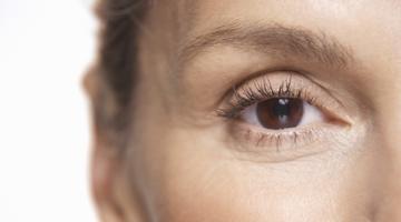 A woman's face fragment with her eye