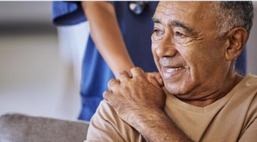 Patient being comforted by NHS worker