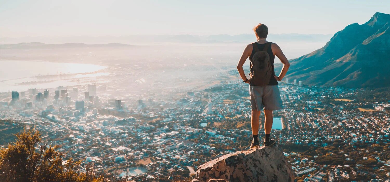 A person standing on a rock