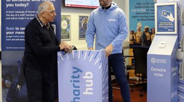 Two people at City Road charity hub
