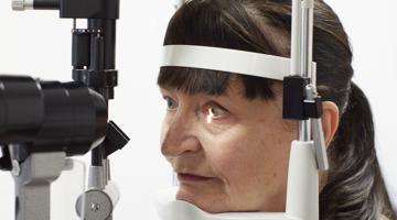 Patient having a slit lamp examination