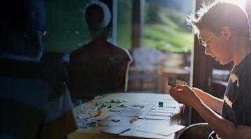 A boy playing board games